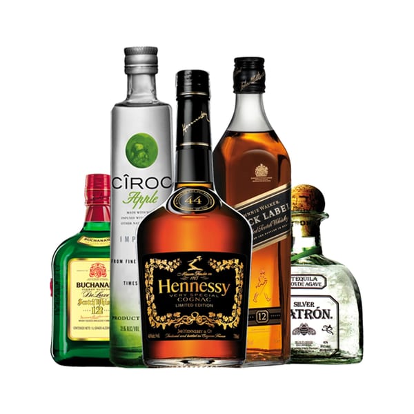 Assortment of liquor bottles including Hennessy, Johnnie Walker, Cîroc Apple, Buchanan's, and Patrón Tequila.